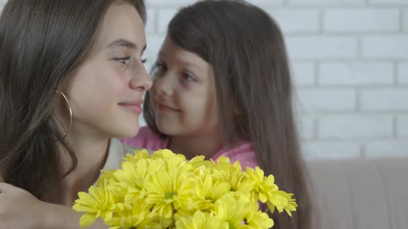 Sisters with flowers. 