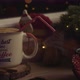 Male Hand Inserting A Straw In A Beverage In A Cozy Christmas Atmosphere - VideoHive Item for Sale