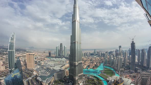 Paniramic Skyline View of Dubai Downtown with Mall Fountains and Burj Khalifa Aerial Timelapse