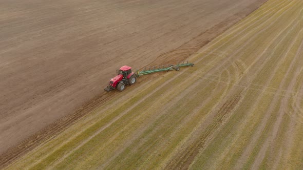 Farmer Plows Land