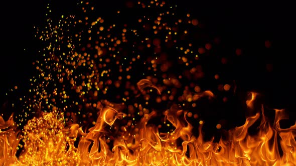 Fire Flames and Sparks in Super Slow Motion Isolated on Black Background