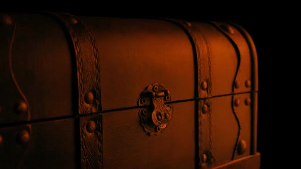 Passing Old Wooden Chest In Firelight