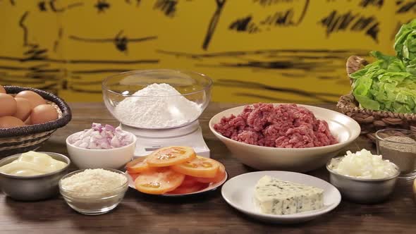 Burger Ingredients on a wooden table - Slider - Right To Left