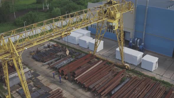 Aerial Shot of Industrial Gantry Crane. Top View of Gantry Crane Installation. Working Process in
