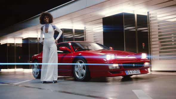 Glamourous Model In 70'S Fashion By Red Ferrari 348 TB