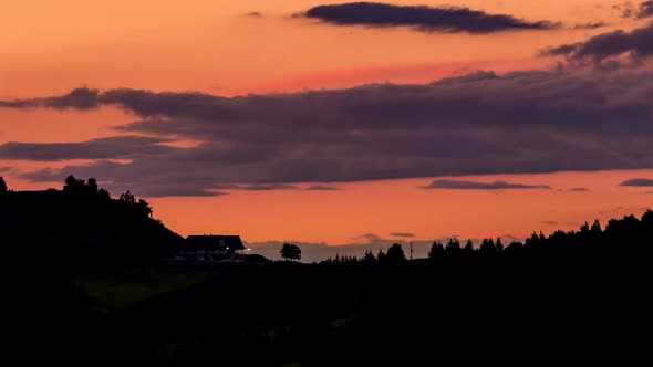 Beautiful Colors of Morning Sky over Holiday Cottage in Summer Nature