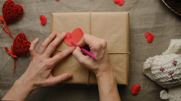 Woman Preparing Valentines Day Present