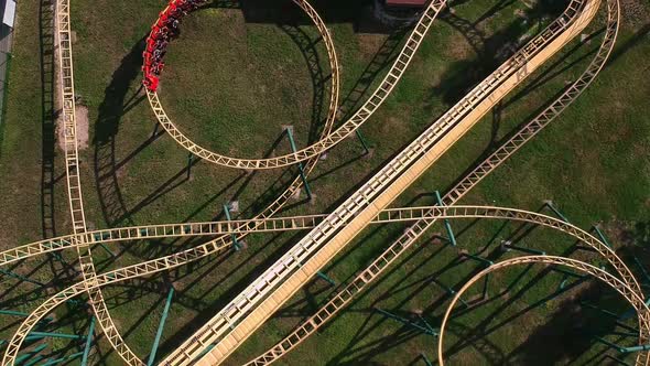 Aerial Drone View of Roller Coaster in Amusement Park