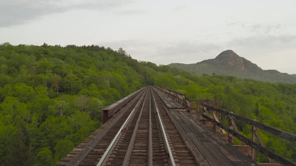 Onawa trestle bridge POV aerial over railway tracks