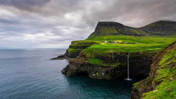 Timelapse of Sunset at Mulafossur Waterfall and Gasadalur Village