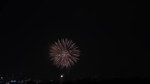 Video Real Golden Shining Fireworks with Bokeh Lights in the Night Sky