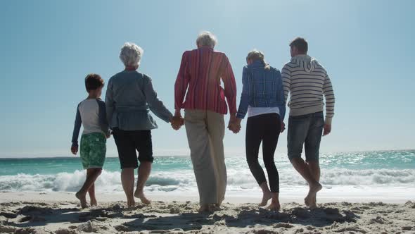 Family enjoying free time on the beach together