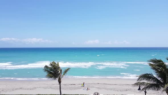 Beachgoers of West Palm Beach, Florida