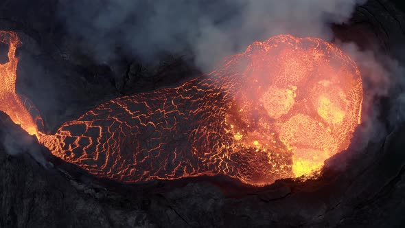 Volcanic Crater With Boiling Lava - aerial top down