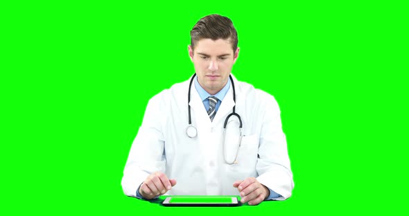 Doctor using digital tablet