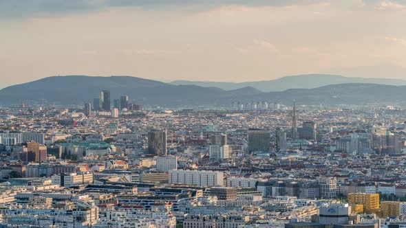 Aerial Panoramic View of Vienna City with Skyscrapers Historic Buildings and a Riverside Promenade