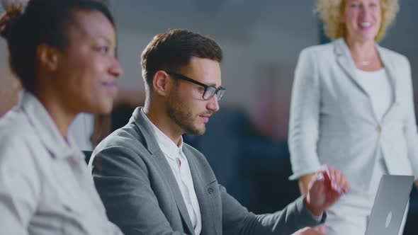 Multi-ethnic group of people at meeting