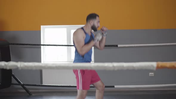 Workout of Middle Eastern Boxer Without Opponent