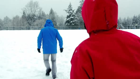 Couple playing with snowball