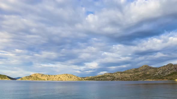 Daytime Timelapse of Clouds Over Sea and Island Turkey