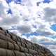 Time Lapse with White Clouds Floating Over a Large Big Haystack - VideoHive Item for Sale