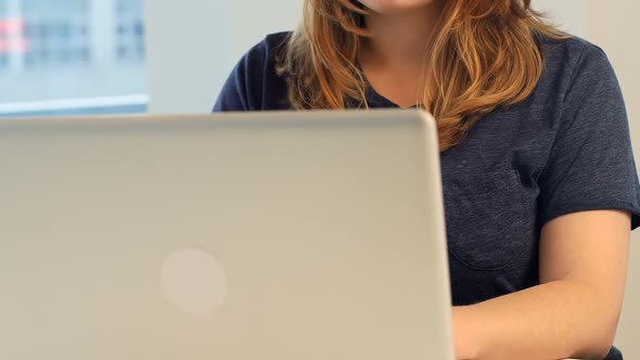 Woman using laptop