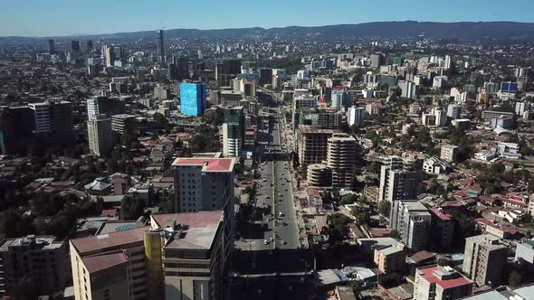 Addis Ababa, Ethiopia. Stunning aerial of dense populated area, highway traffic and high city buildi
