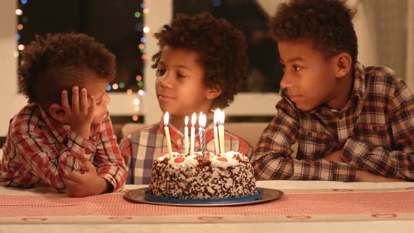 Afro Boys and Birthday Cake.