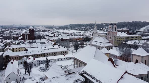 Drone ascends and reveals beautiful downtown of Kaunas city, Lithuania