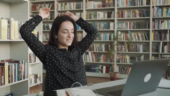 Young Happy Businesswoman Relaxing Resting in Office, Library