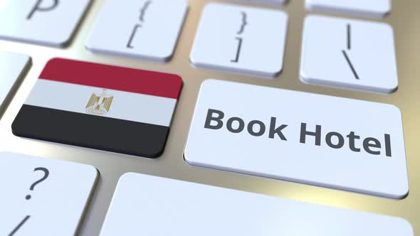 BOOK HOTEL Text and Flag of Egypt on the Keys
