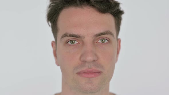 Face Close Up of Serious Young Man