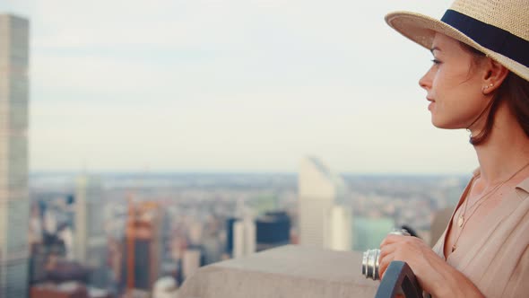 Beautiful woman on the roof of New York