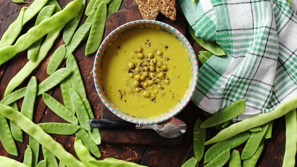 Green Pea Cream Soup in Grey Bowl