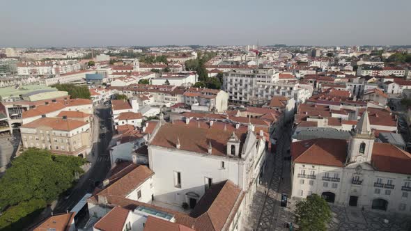 Majestic cityscape and rooftops of Aveiro in Portugal, aerial orbit view