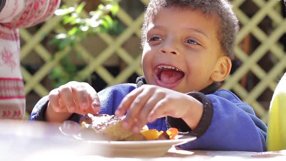 Happy Child Eats Meat.