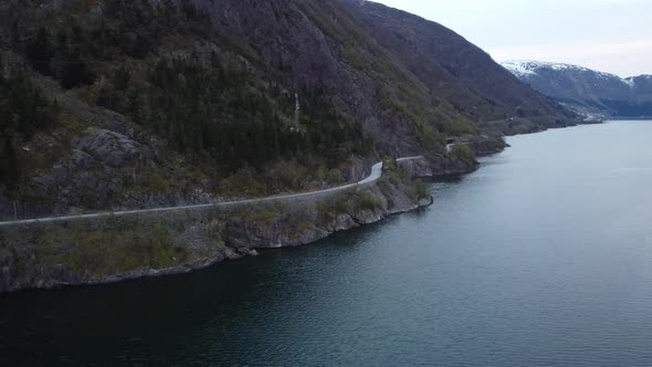 Evening at curvy road E16 close to Skreia and Vaksdal - K5 new road project and dumping of rocks to