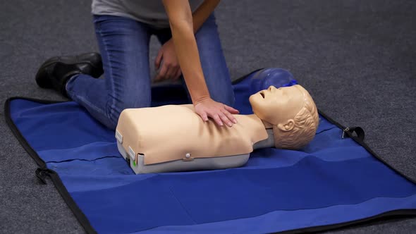 Infant CPR manikin first aid. Cardiopulmonary resuscitation and first aid for child
