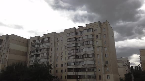 an Ugly Soviet Building During Cloudy Weather