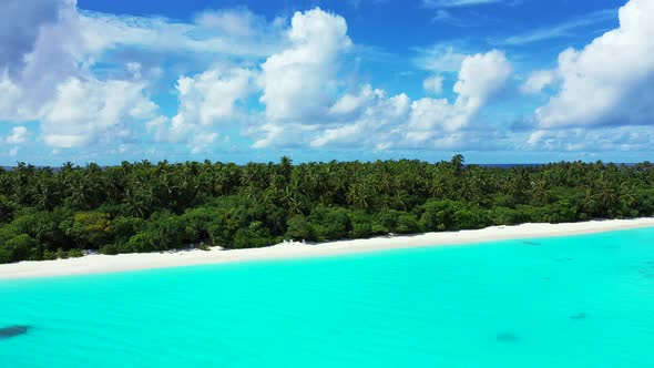 Daytime flying abstract view of a sunshine white sandy paradise beach and blue sea background in col