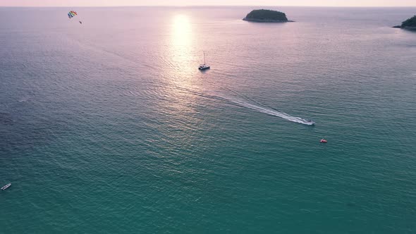 Parasailing at Sunset with a View of the Island