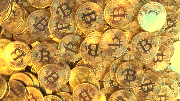 A Pile of Shiny Golden Bitcoin Tokens alt