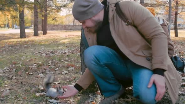 Feeding Cute Squirrel