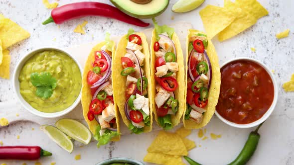 Tasty Mexican Meat Tacos Served with Various Vegetables and Salsa