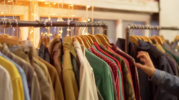 Couple Choosing Clothes at Vintage Clothing Store 29