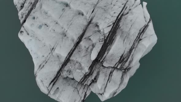 Aerial Ascent Above an Iceberg.