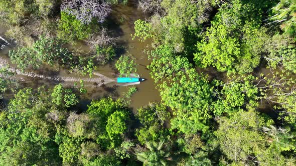 Boat sailing at Amazon River at Amazon Rainforest. Manaus Brazil.