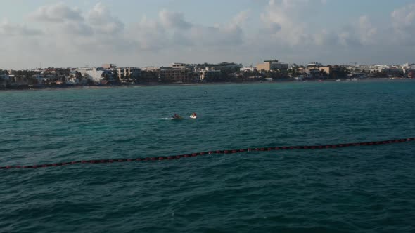 Jet Ski Riding on Calm Water Surface Close to Playa Del Carmen Mexico