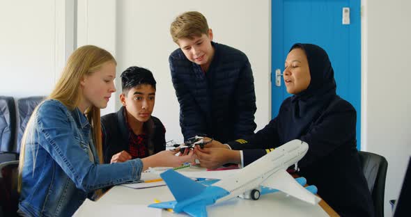 Female pilot about model drone to kids 4k