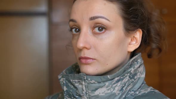 Indoor Portrait of Young Girl Wearing Military Uniform Mandatory Conscription in Ukraine Russian